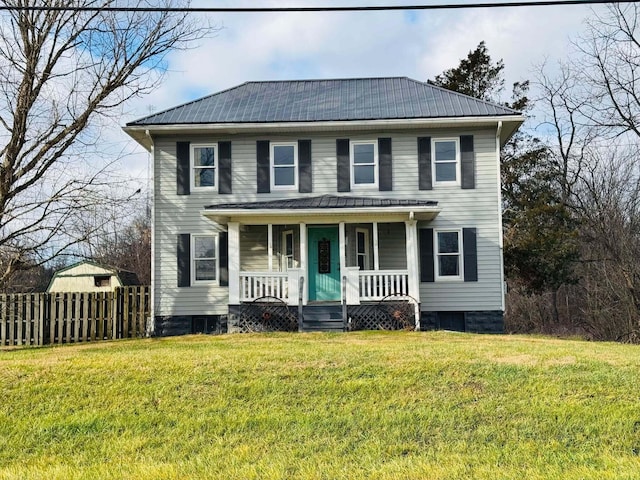 view of front facade with a front lawn and covered porch