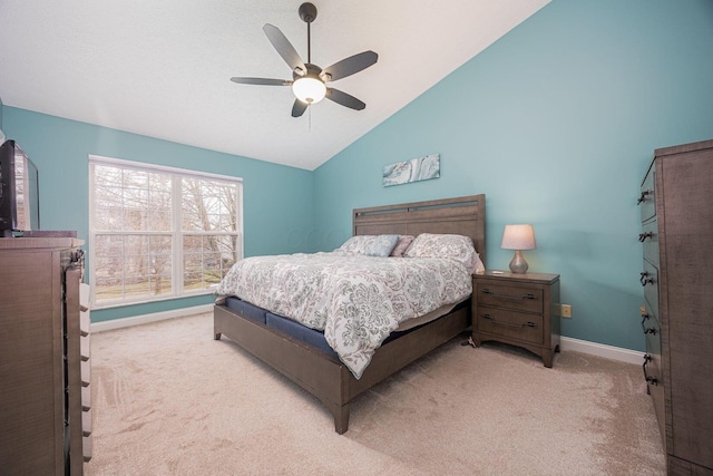 bedroom featuring light colored carpet, ceiling fan, and lofted ceiling