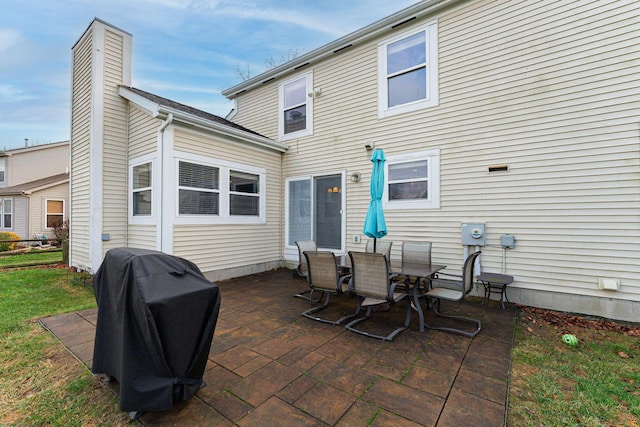 rear view of house with a patio