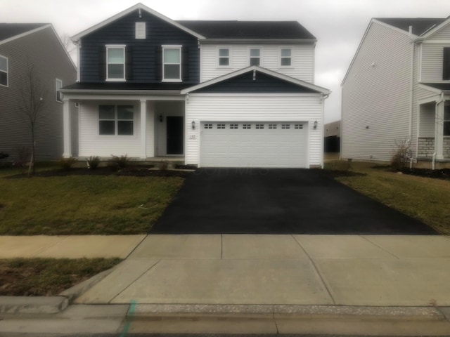 view of front of property with a front lawn