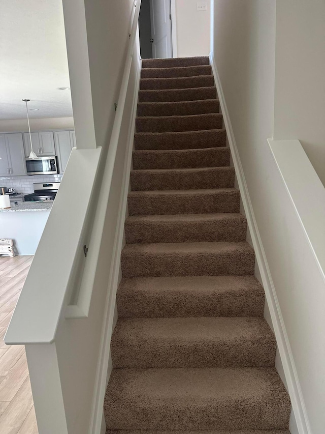 198 Whitetail Trl, Johnstown, OH 43031 - stairs featuring wood finished floors