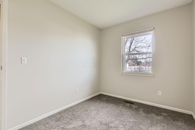 unfurnished room featuring carpet flooring