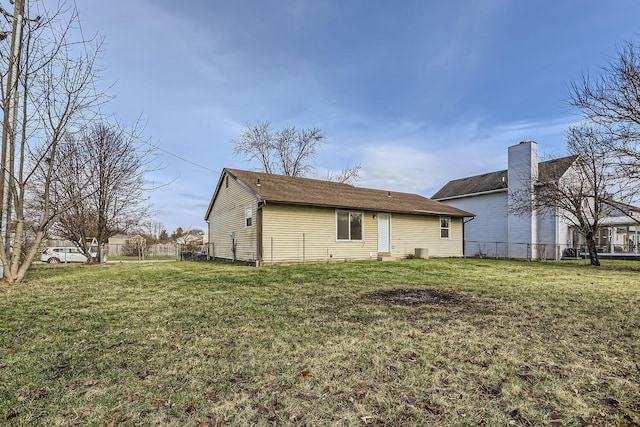 view of property exterior featuring a lawn