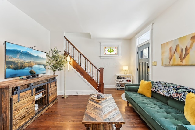 living room with dark hardwood / wood-style flooring