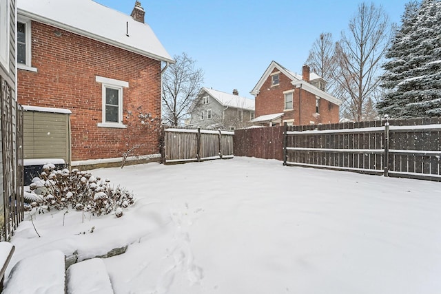 view of yard covered in snow