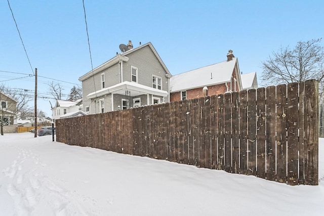 view of yard covered in snow