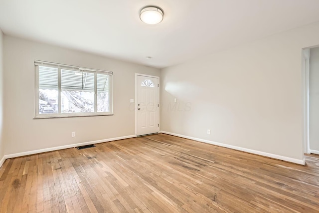 entrance foyer featuring light wood-type flooring