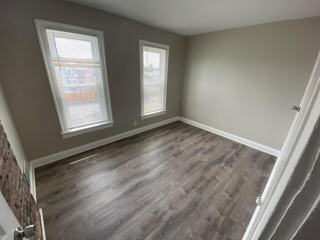 655-657 Frebis Ave, Columbus, OH 43206 - unfurnished room featuring dark wood-type flooring