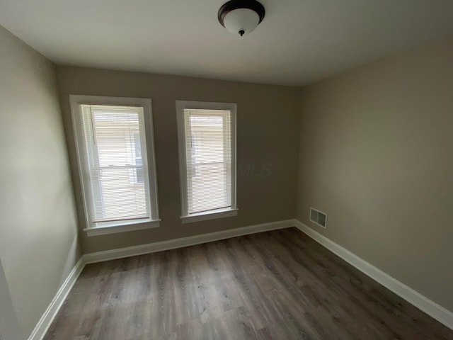 655-657 Frebis Ave, Columbus, OH 43206 - unfurnished room with dark hardwood / wood-style flooring