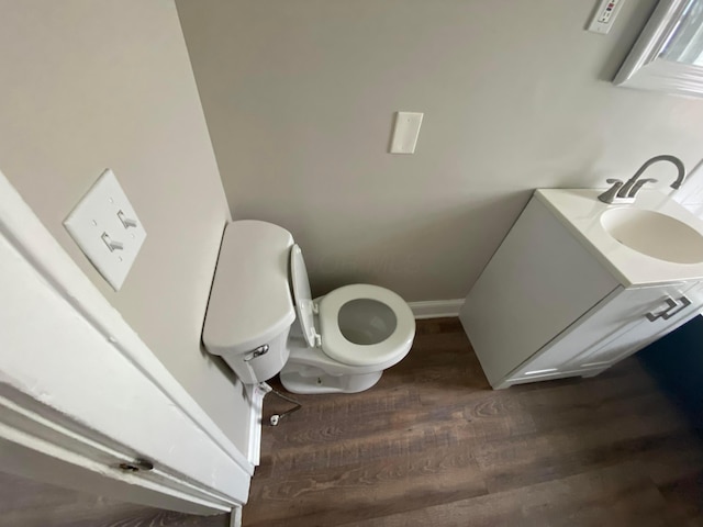 655-657 Frebis Ave, Columbus, OH 43206 - bathroom with toilet, vanity, and hardwood / wood-style flooring
