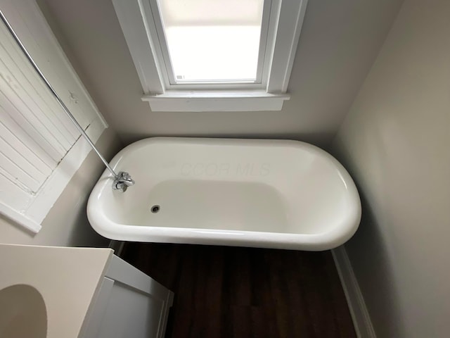655-657 Frebis Ave, Columbus, OH 43206 - bathroom with a washtub and vanity