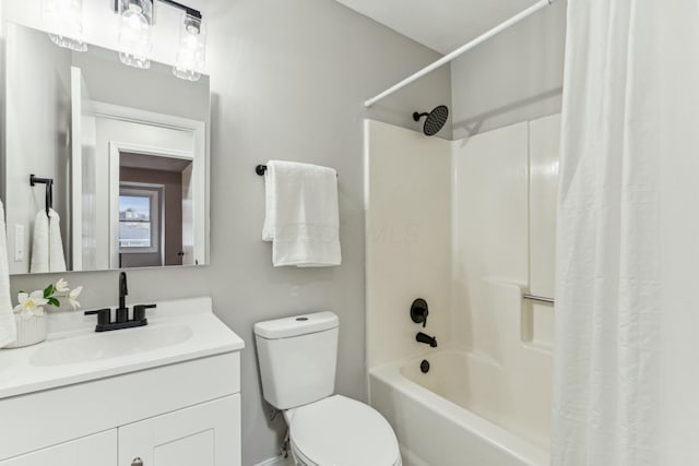 full bathroom with vanity, toilet, and shower / bath combo