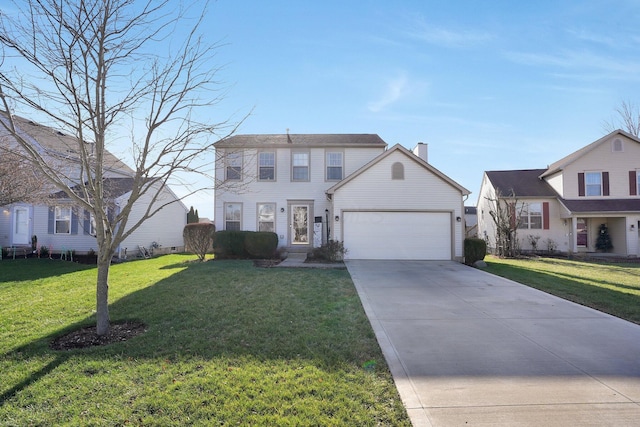 view of front of home with a front yard and a garage