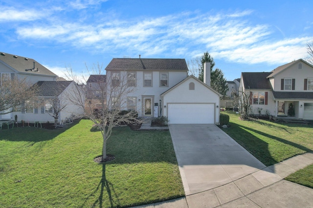 view of front facade featuring a garage and a front yard