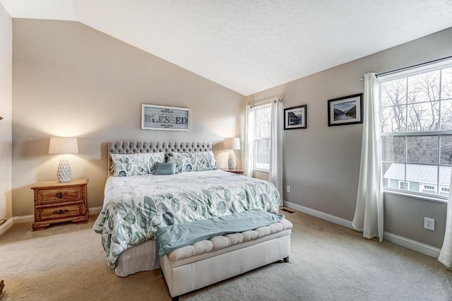 bedroom featuring light carpet and vaulted ceiling