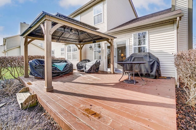 deck with a gazebo and grilling area