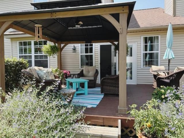 exterior space with a gazebo and a deck