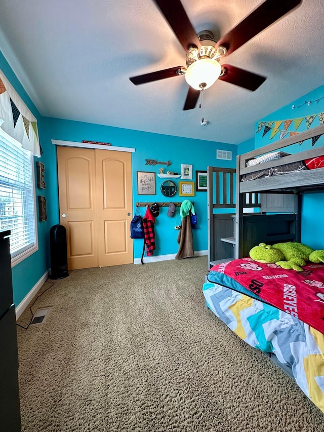 bedroom with carpet and ceiling fan