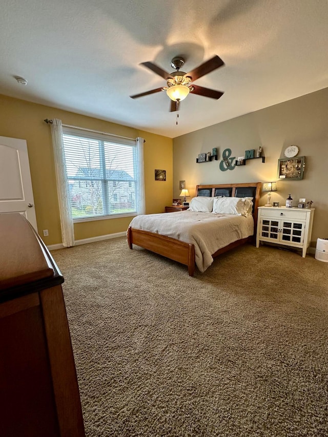 bedroom with carpet flooring and ceiling fan