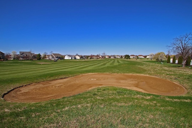 view of community featuring a lawn