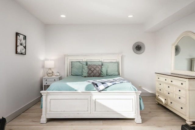 bedroom featuring light hardwood / wood-style flooring