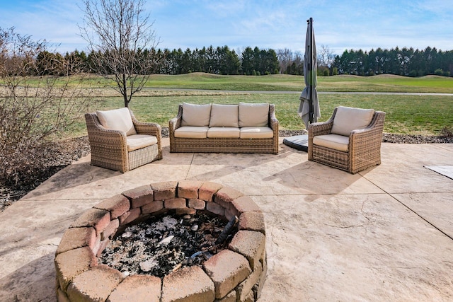 view of patio featuring a fire pit