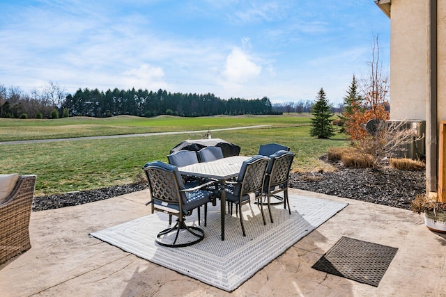 view of patio / terrace with area for grilling and central air condition unit