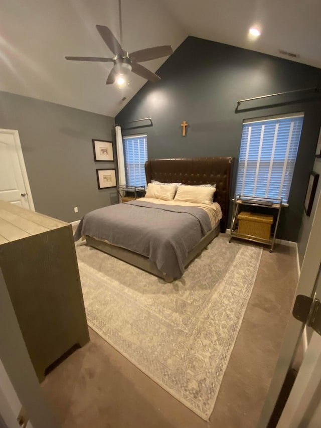 bedroom featuring ceiling fan and lofted ceiling