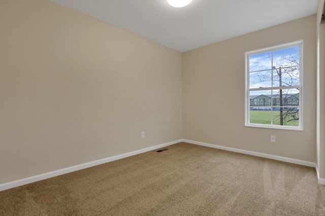 view of carpeted spare room