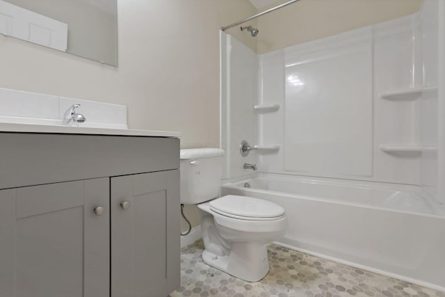 full bathroom featuring vanity, toilet, and tub / shower combination