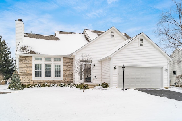 view of front of property with a garage