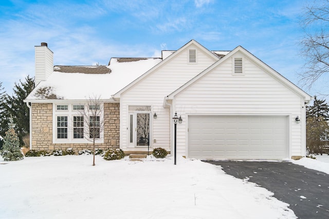 view of front of property featuring a garage