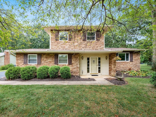 view of property featuring a front yard