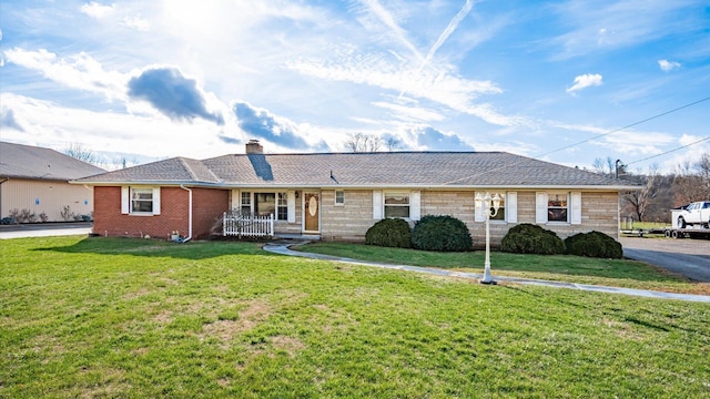 ranch-style home with a porch and a front lawn