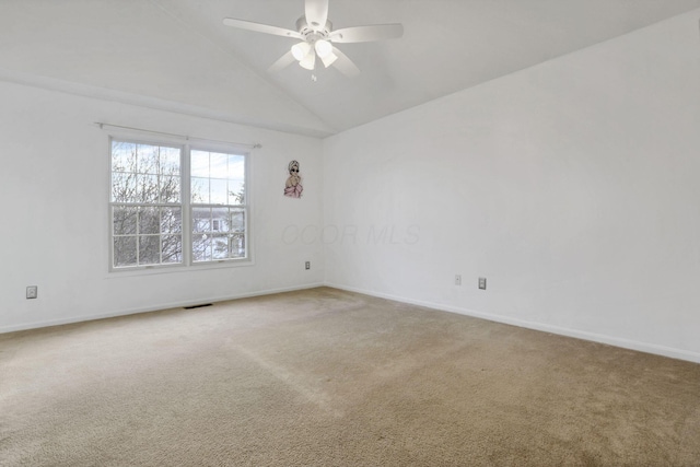 unfurnished room with ceiling fan, carpet floors, and high vaulted ceiling