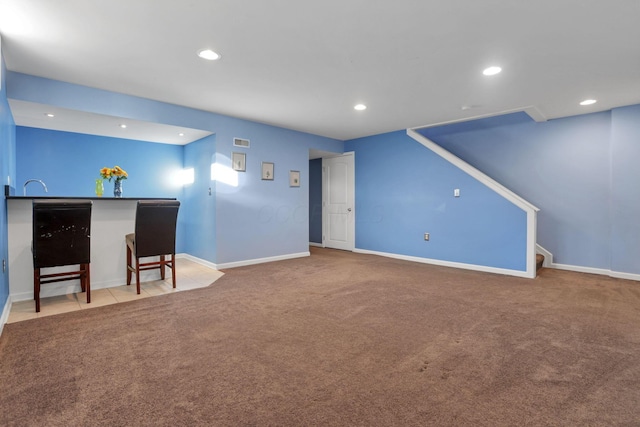 unfurnished living room with carpet floors