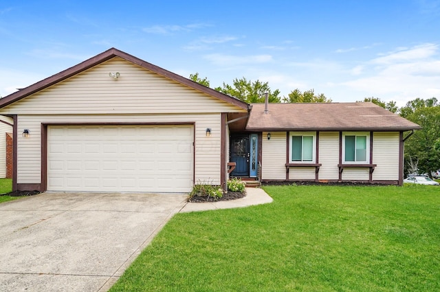 ranch-style home with a garage and a front lawn