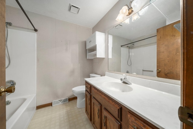 full bathroom featuring shower / bathing tub combination, vanity, and toilet