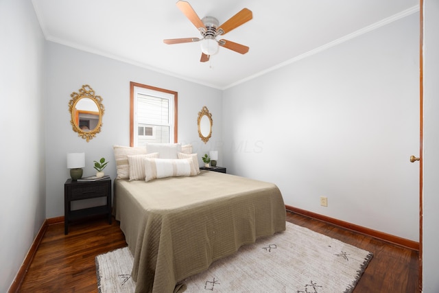 bedroom with crown molding, ceiling fan, and dark wood-type flooring