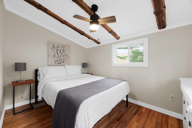 bedroom with vaulted ceiling, ceiling fan, and dark hardwood / wood-style floors