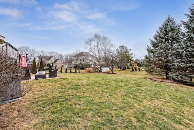 view of yard with a playground