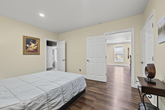 bedroom featuring dark hardwood / wood-style floors