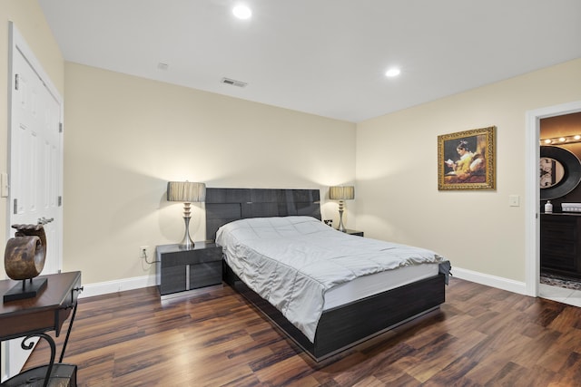 bedroom featuring dark hardwood / wood-style floors