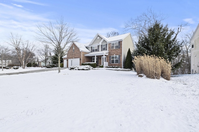 front of property with a garage