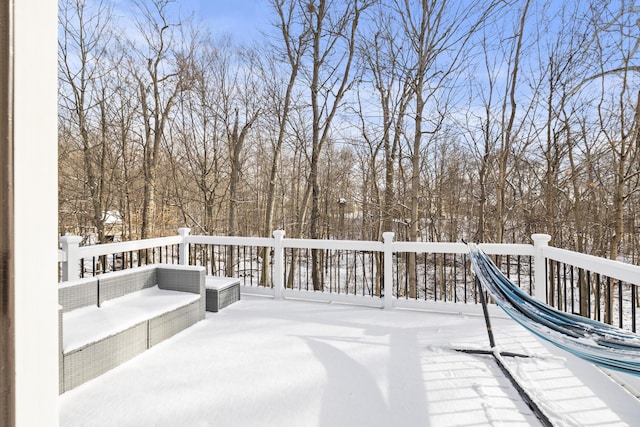 view of snow covered deck