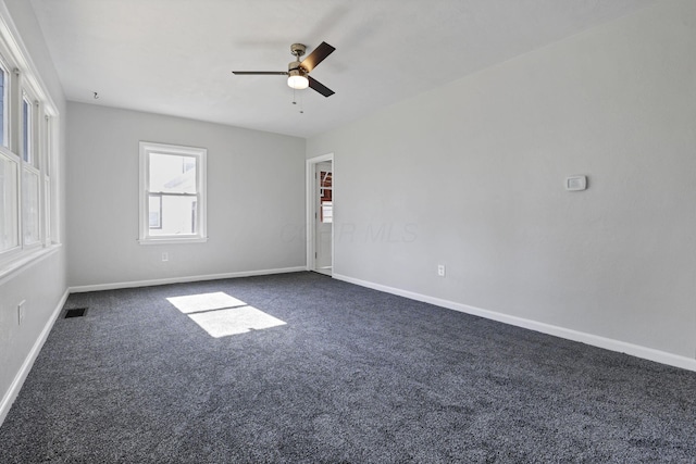 unfurnished room with ceiling fan