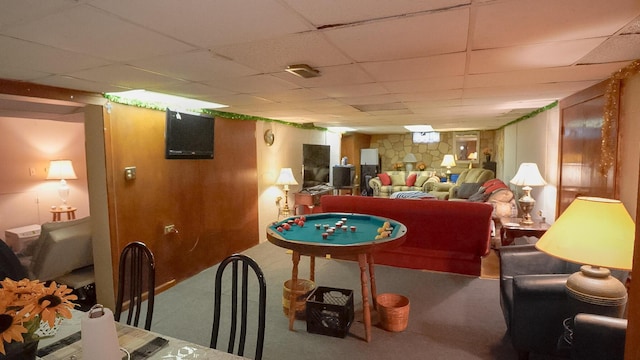 playroom featuring a paneled ceiling