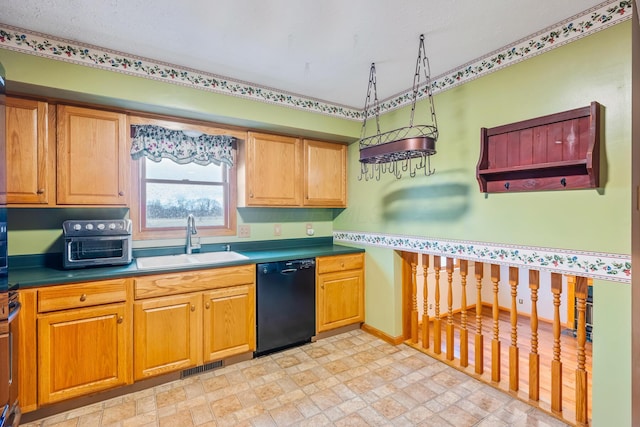 kitchen with dishwasher, range, and sink