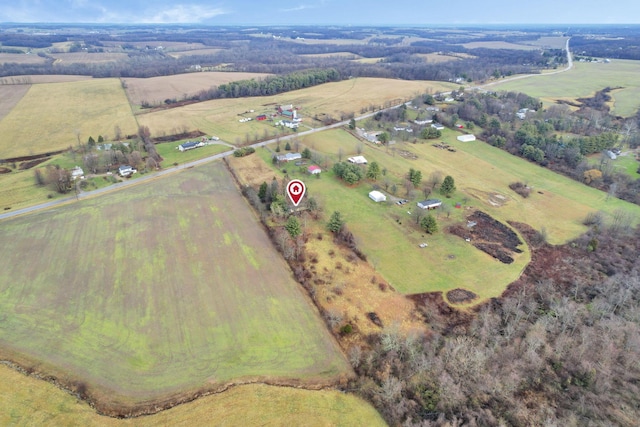 birds eye view of property featuring a rural view