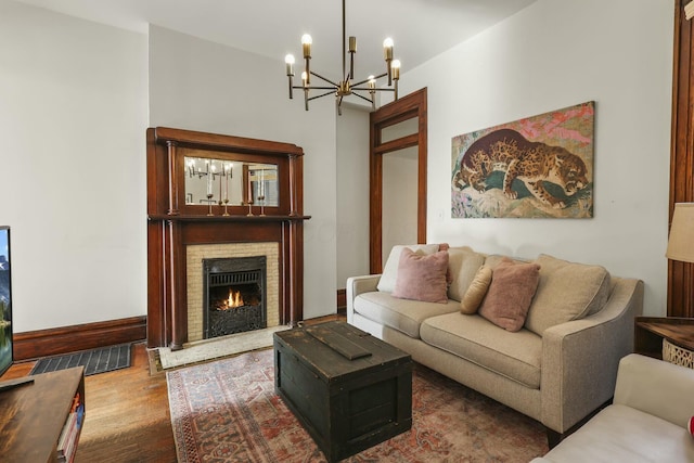 living room featuring a notable chandelier and hardwood / wood-style flooring